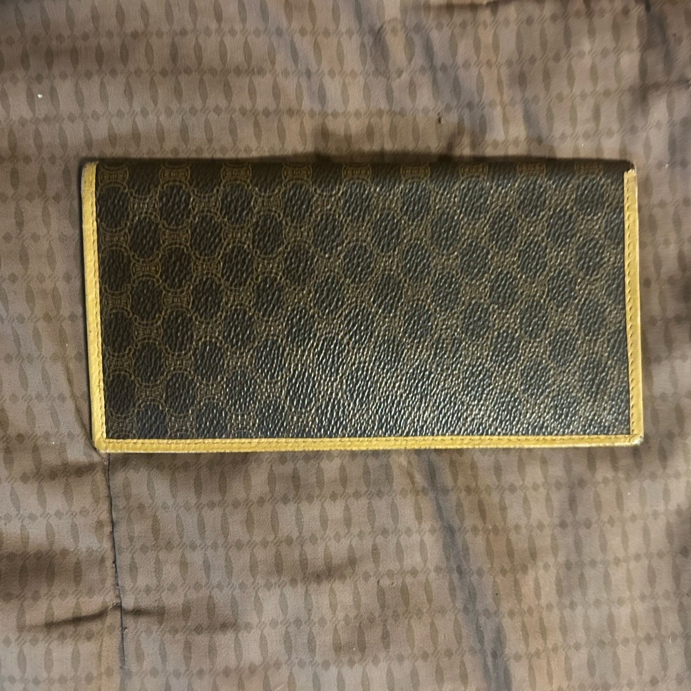 vintage Celine Macadam canvas long bifold wallet with leather trim.